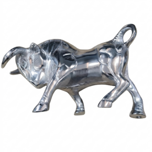 Polished chrome charging bull figurine on a plain white background for home or office decor