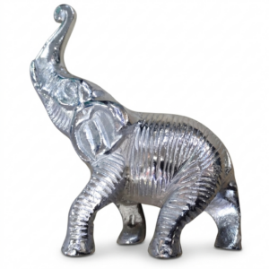 A finely detailed, highly polished solid silver elephant figurine in a dynamic pose, looking upwards with its trunk raised high, showcasing its intricately patterned surface texture against a clean white background."