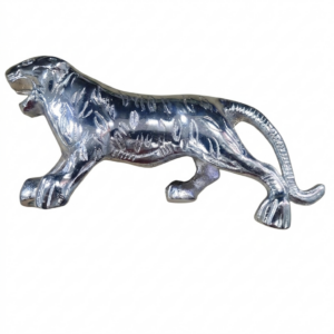High-polish metallic chrome tiger figurine in a side profile prowling pose, with detailed engraved stripes, on a plain white background.
