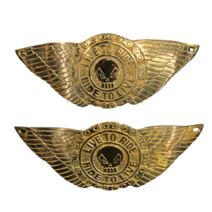 Pair of SSM MOTO premium brass "Live to Ride" winged skull emblem badges for motorcycles.